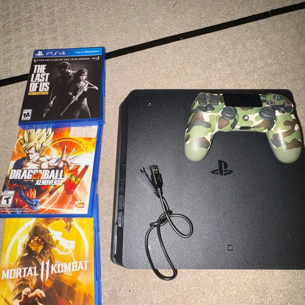 Ps4 with controller (including power cord and chargers) and 3 games